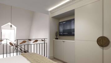 Un dormitorio con una cama, un televisor instalado en la pared y una escalera con barandilla.