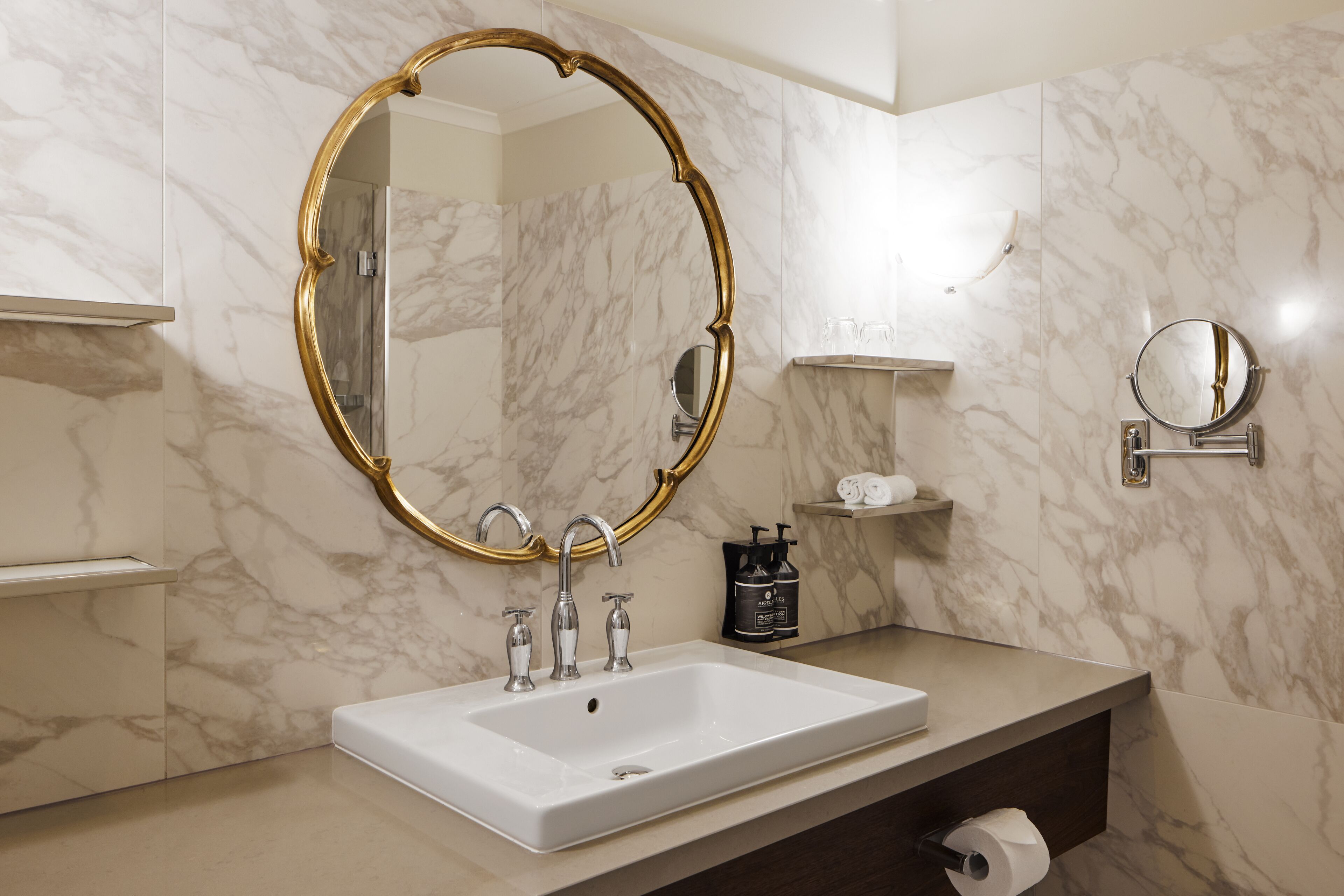 designer toiletries, hair dryer, bathrobes, towels