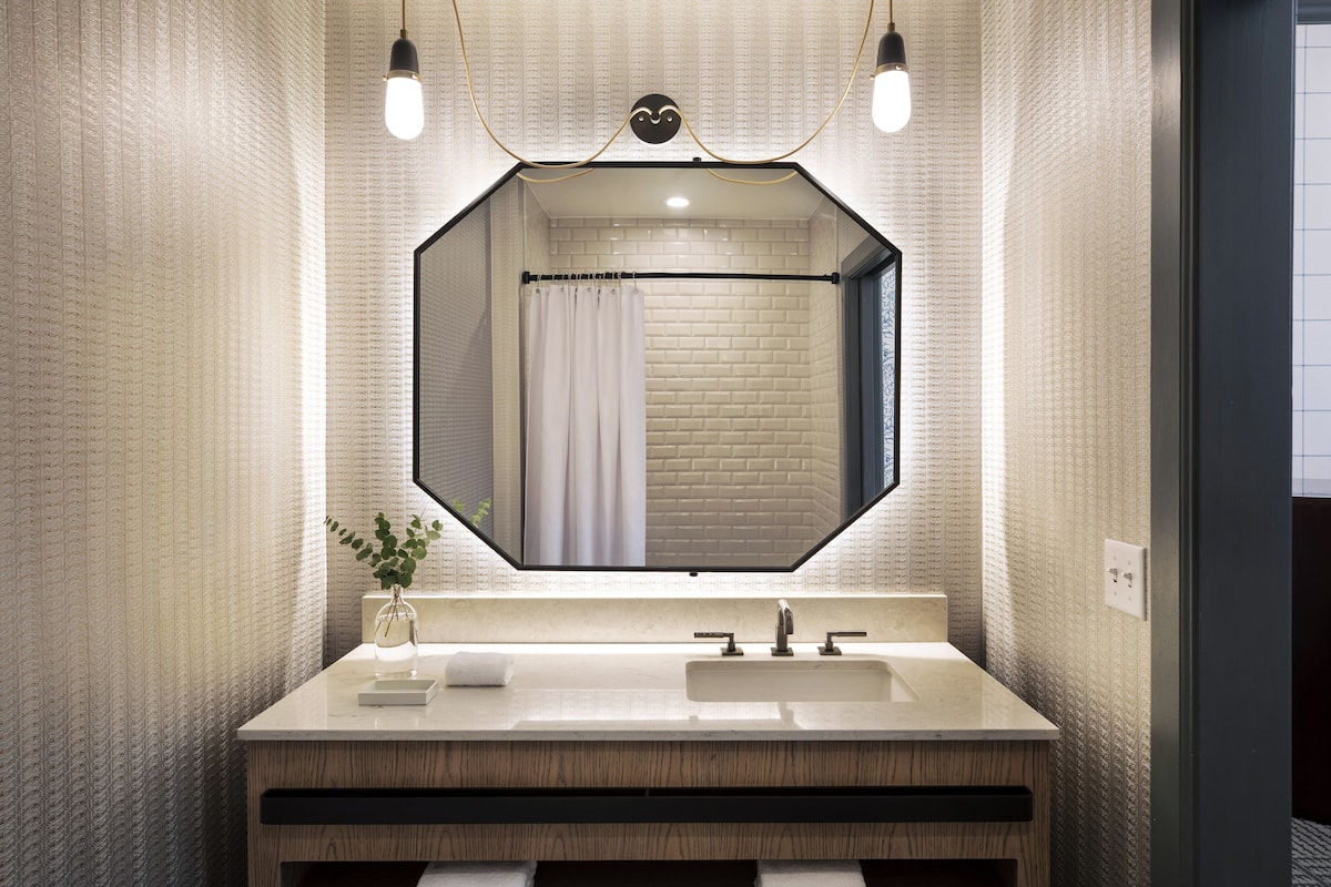 designer toiletries, hair dryer, bathrobes, towels