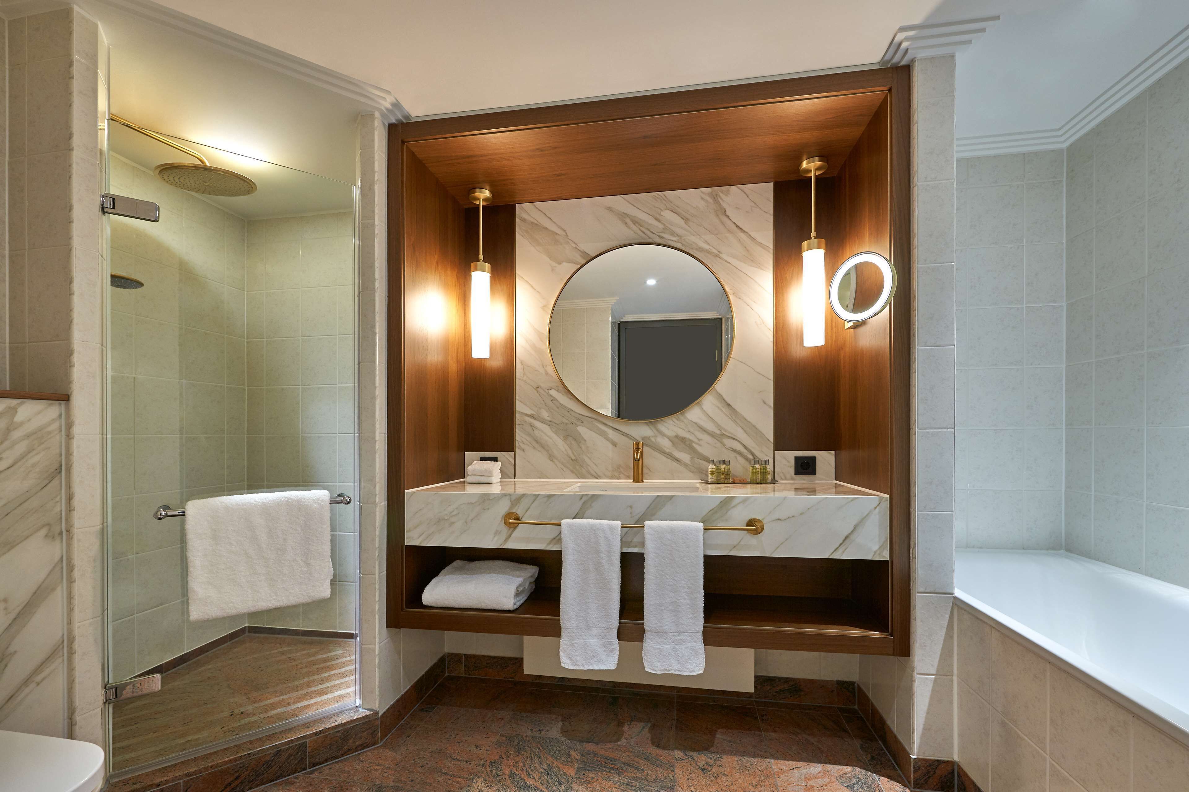 separate bathtub and shower, free toiletries, hair dryer, bathrobes