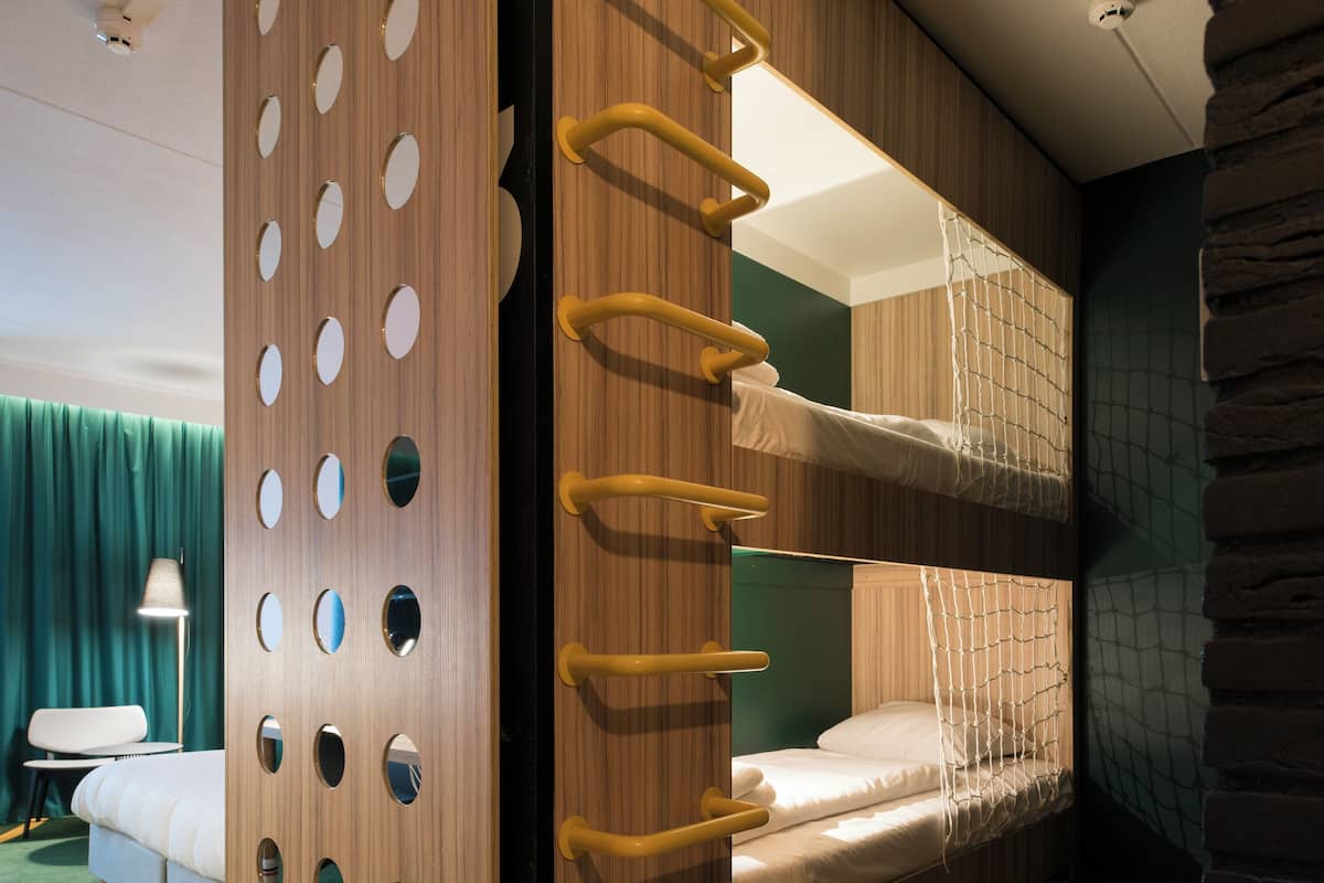 Family Room | In-room safe, desk, blackout curtains, iron/ironing board