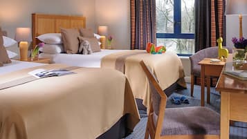Family Room | Premium bedding, desk, laptop workspace, free WiFi