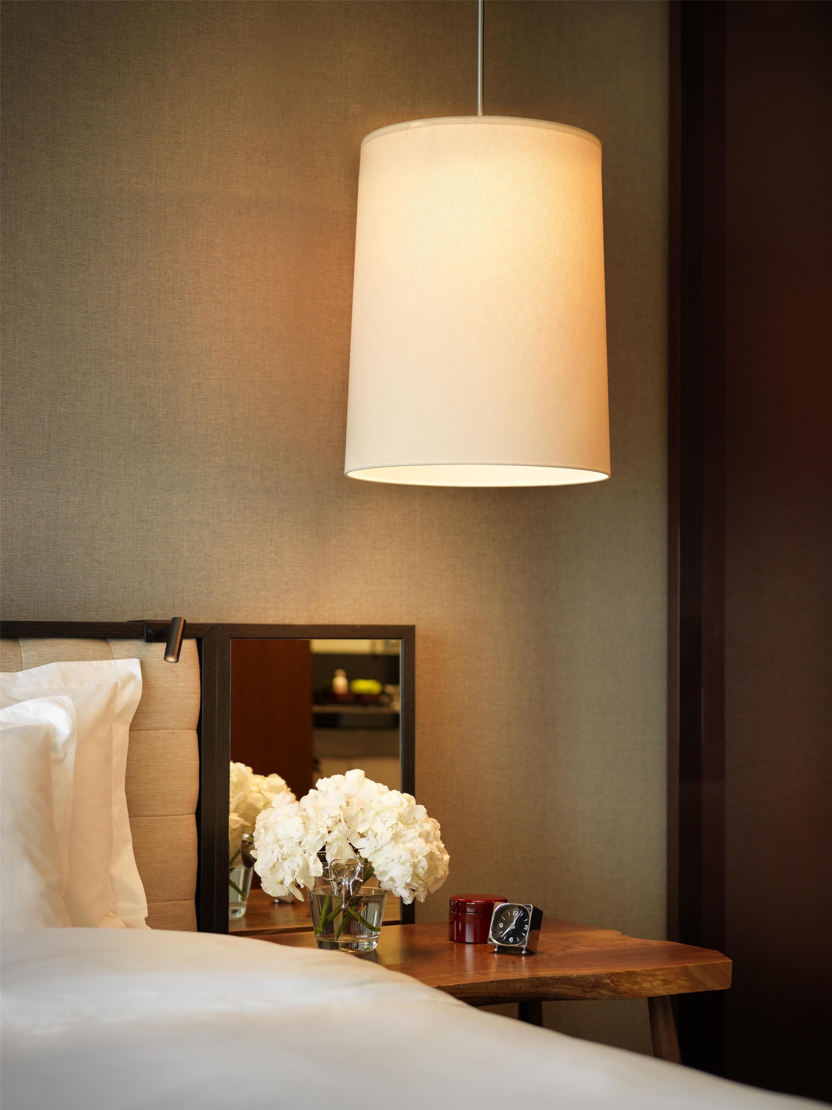 Premium bedding, down comforters, minibar, in-room safe