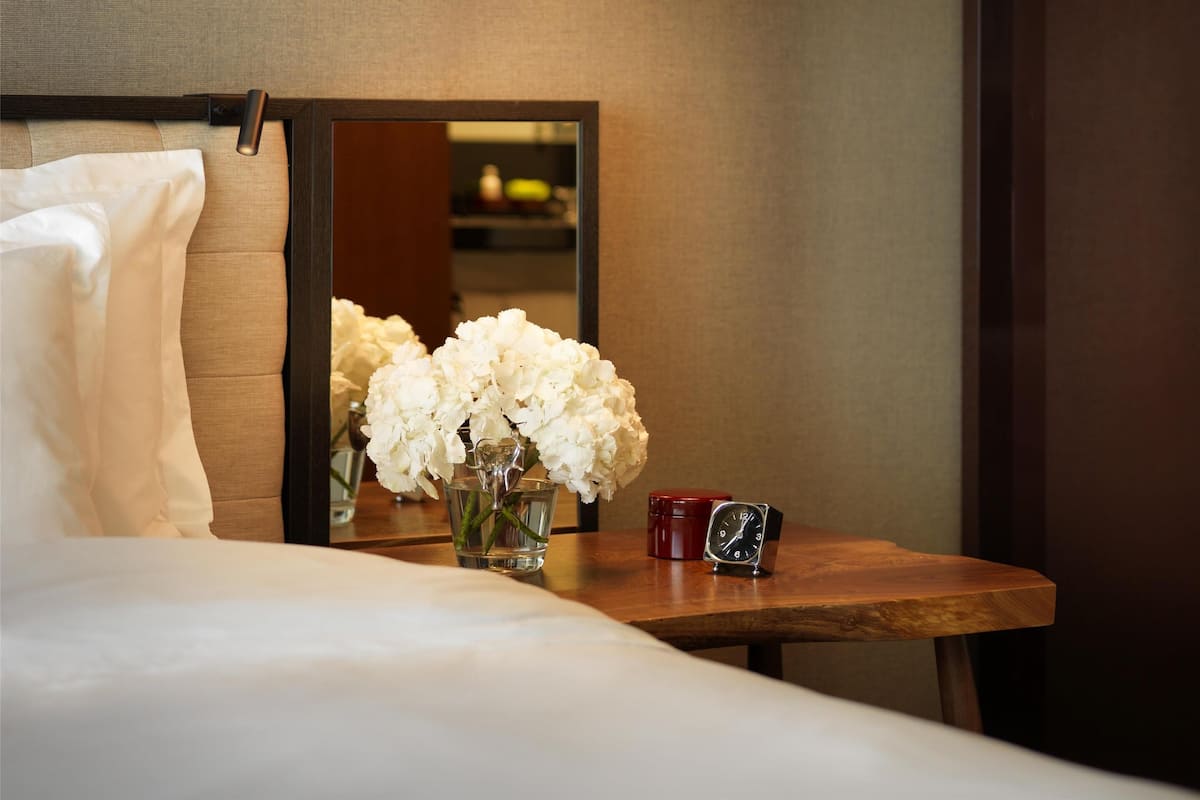 Premium bedding, down comforters, minibar, in-room safe
