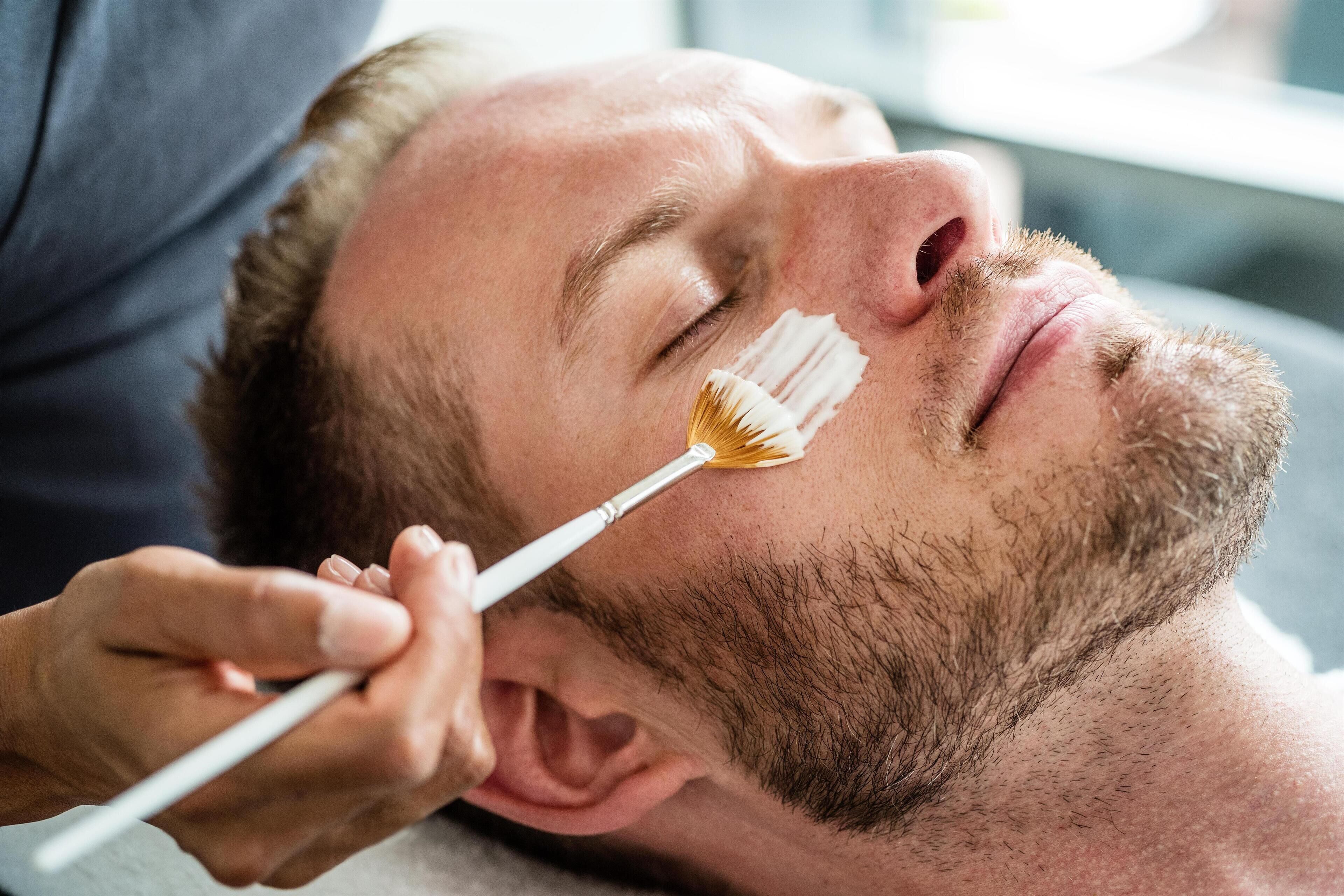 A person receiving a facial treatment.