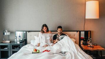 Premium bedding, down comforters, minibar, in-room safe