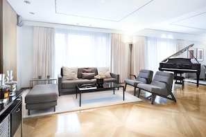 Premium bedding, down comforters, minibar, in-room safe
