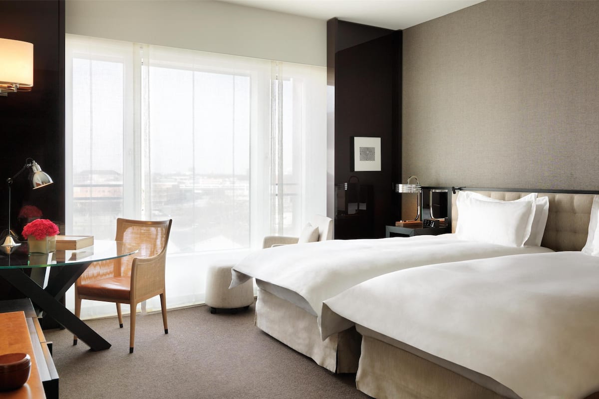 Premium bedding, down comforters, minibar, in-room safe