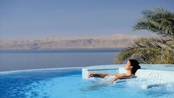 8 outdoor pools, pool umbrellas, pool loungers