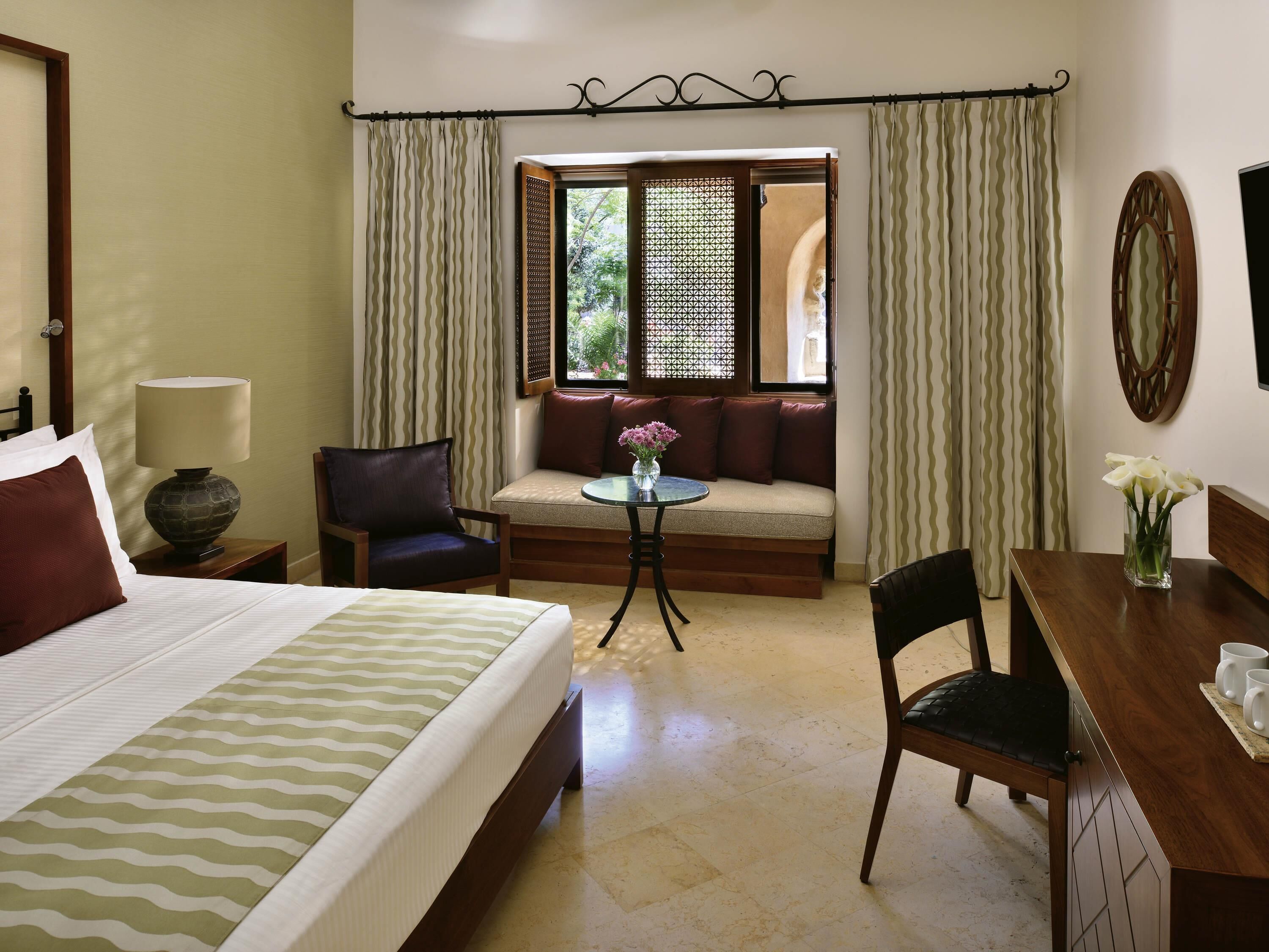 Free minibar items, in-room safe, desk, laptop workspace