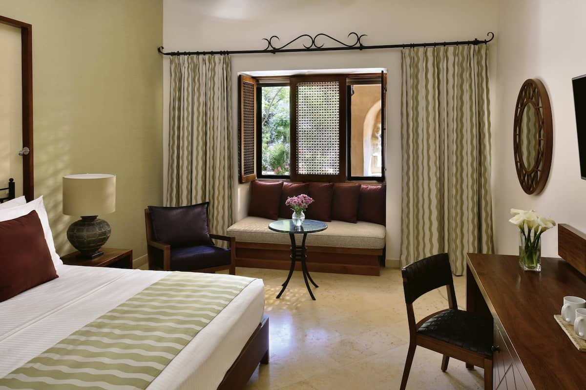 Free minibar items, in-room safe, desk, laptop workspace