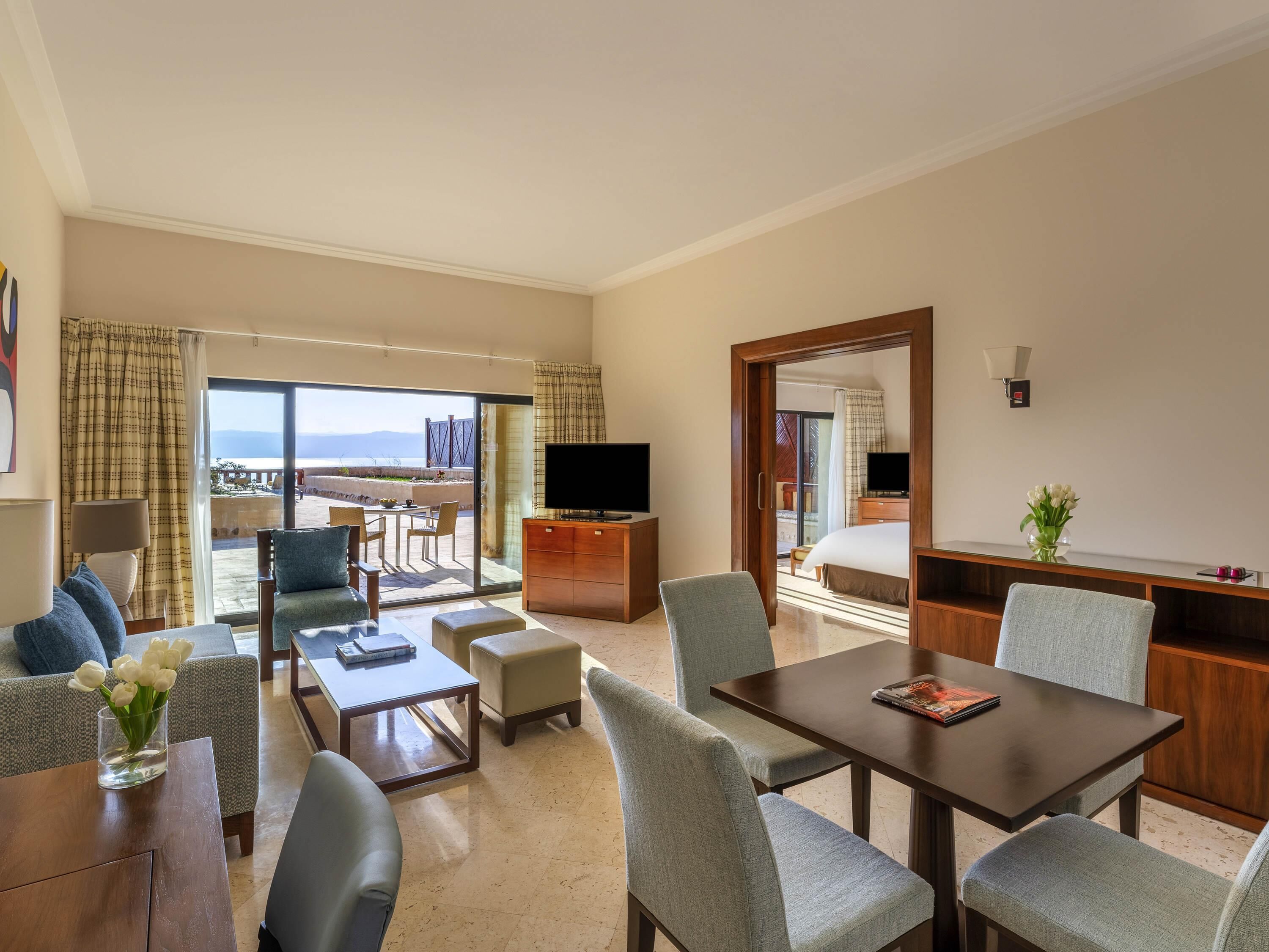 Suite, 1 King Bed, Sea View | Free minibar items, in-room safe, desk, laptop workspace