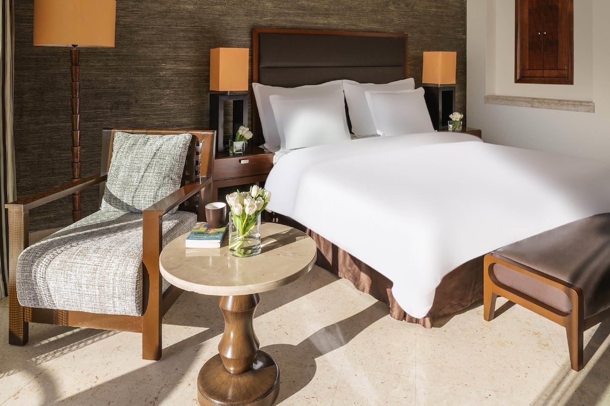 Premium Room, 1 King Bed, Sea View | 1 bedroom, free minibar items, in-room safe, desk