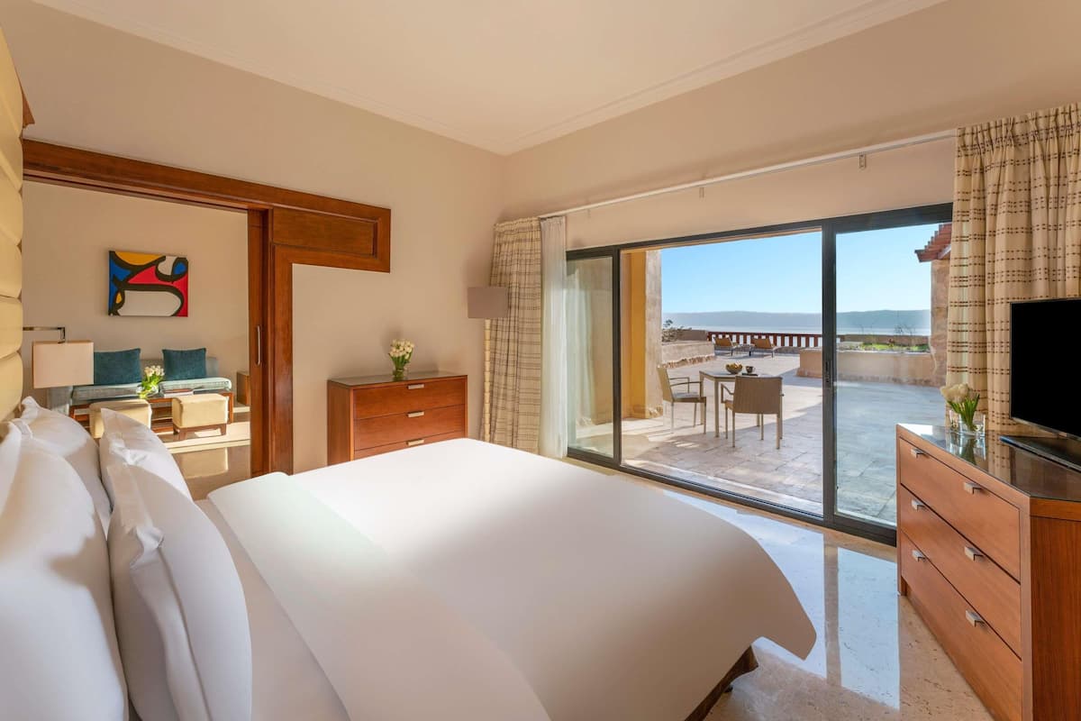 Suite, 1 King Bed, Sea View | 1 bedroom, free minibar items, in-room safe, desk
