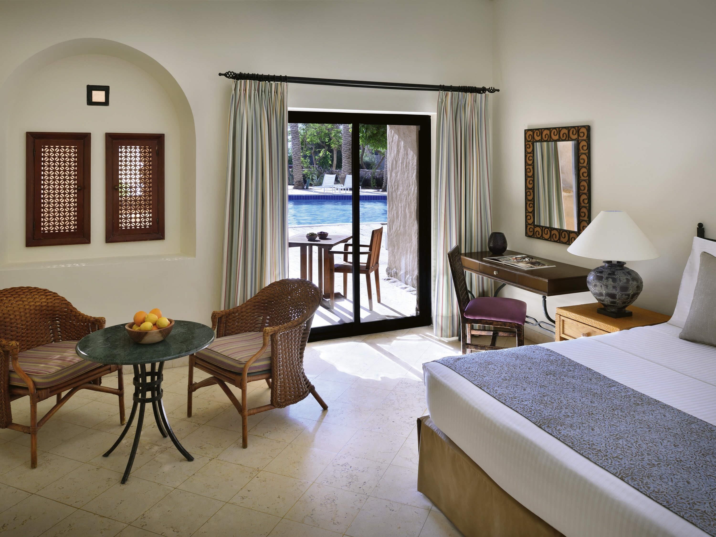 Premium Room, 1 King Bed, Pool View | Free minibar items, in-room safe, desk, laptop workspace