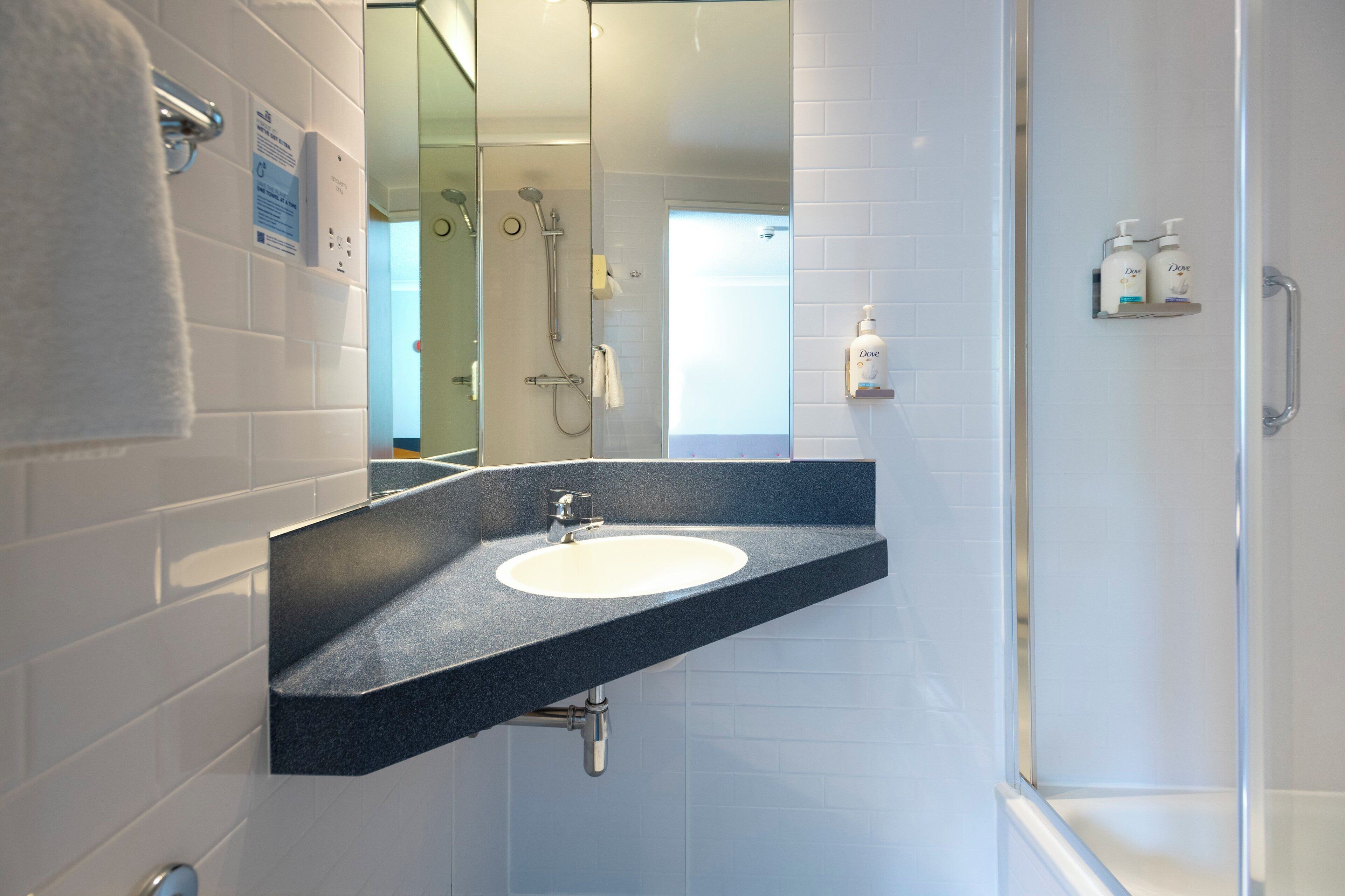 shower, eco-friendly toiletries, hair dryer, towels