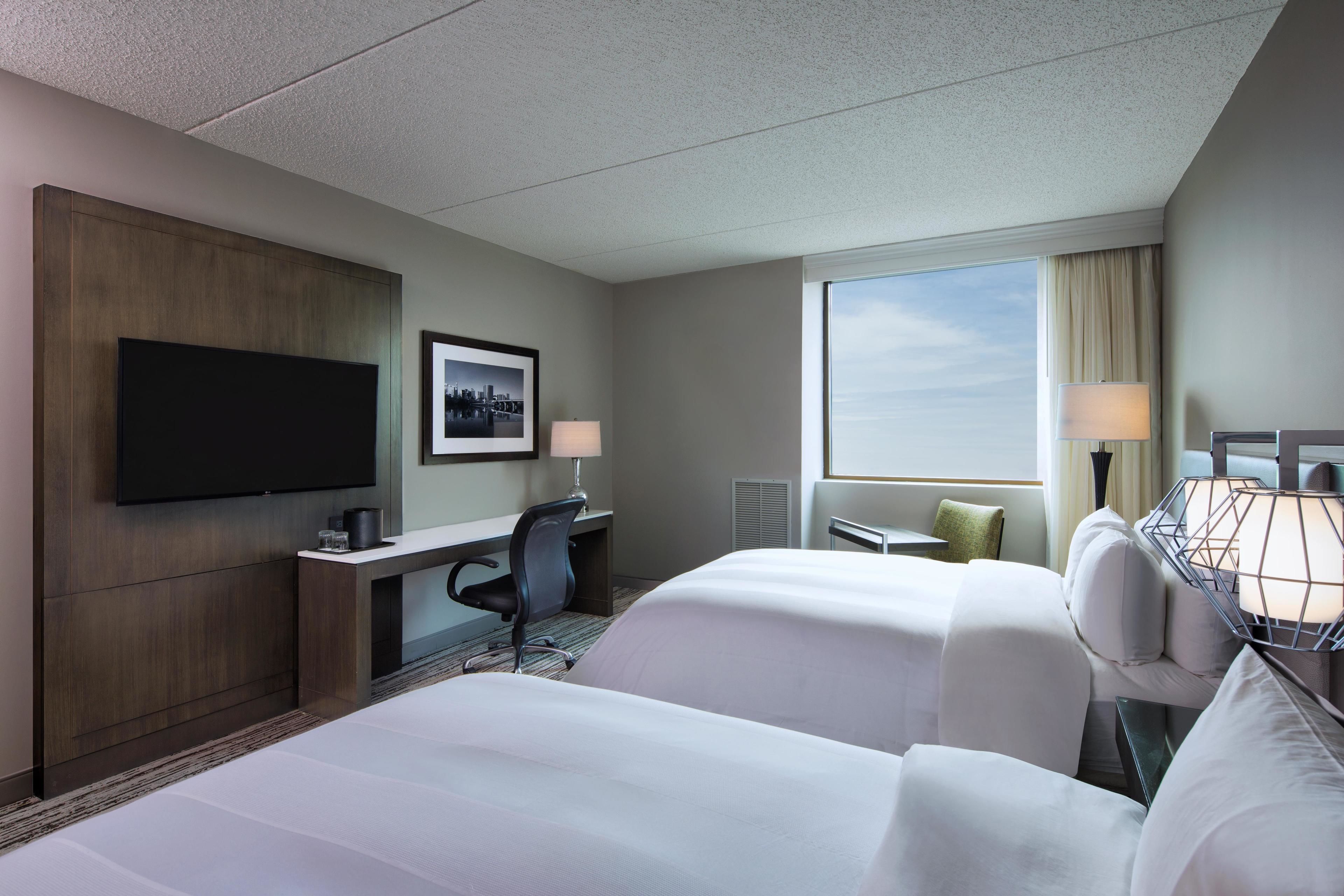 premium bedding, down duvets, pillow-top beds, in-room safe