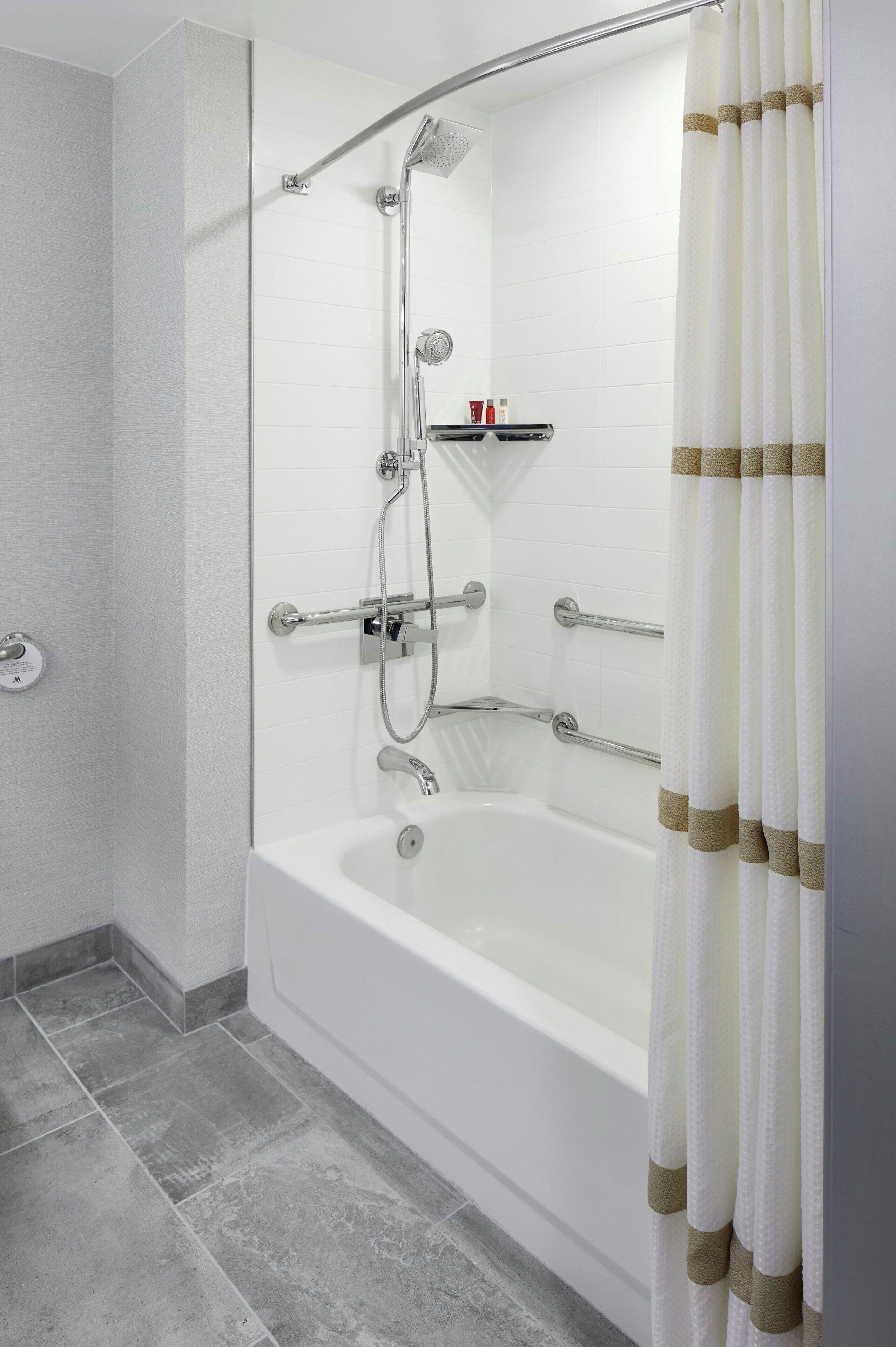 room, 1 king bed, non smoking | bathroom | combined shower/bathtub, designer toiletries, hair dryer, towels