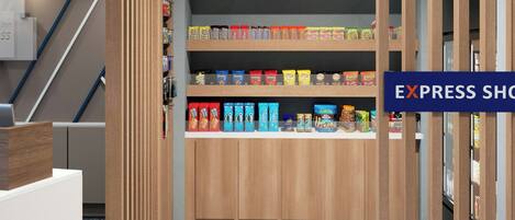 A modern retail space with wooden paneling and a variety of snack products on shelves.
