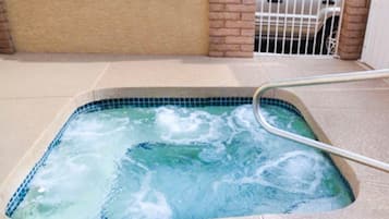 Outdoor pool, open 9:30 AM to 9:30 PM, pool umbrellas, pool loungers