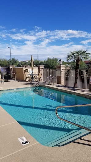 Outdoor pool, open 7 AM to 10 PM, sun loungers