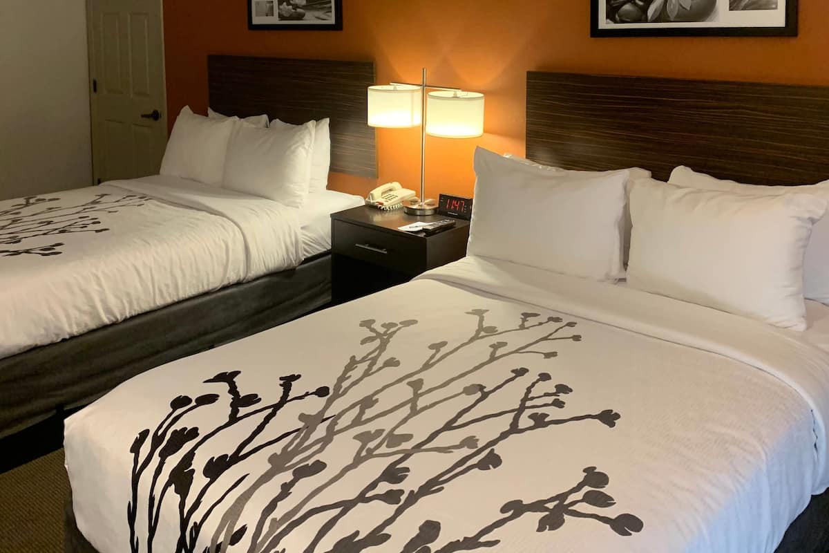 Down comforters, blackout drapes, iron/ironing board