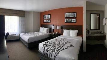 Down comforters, blackout drapes, iron/ironing board