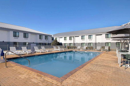 Seasonal outdoor pool. Spark by Hilton Bentonville