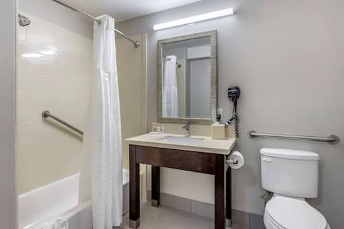 Rainfall showerhead, free toiletries, hair dryer, towels
