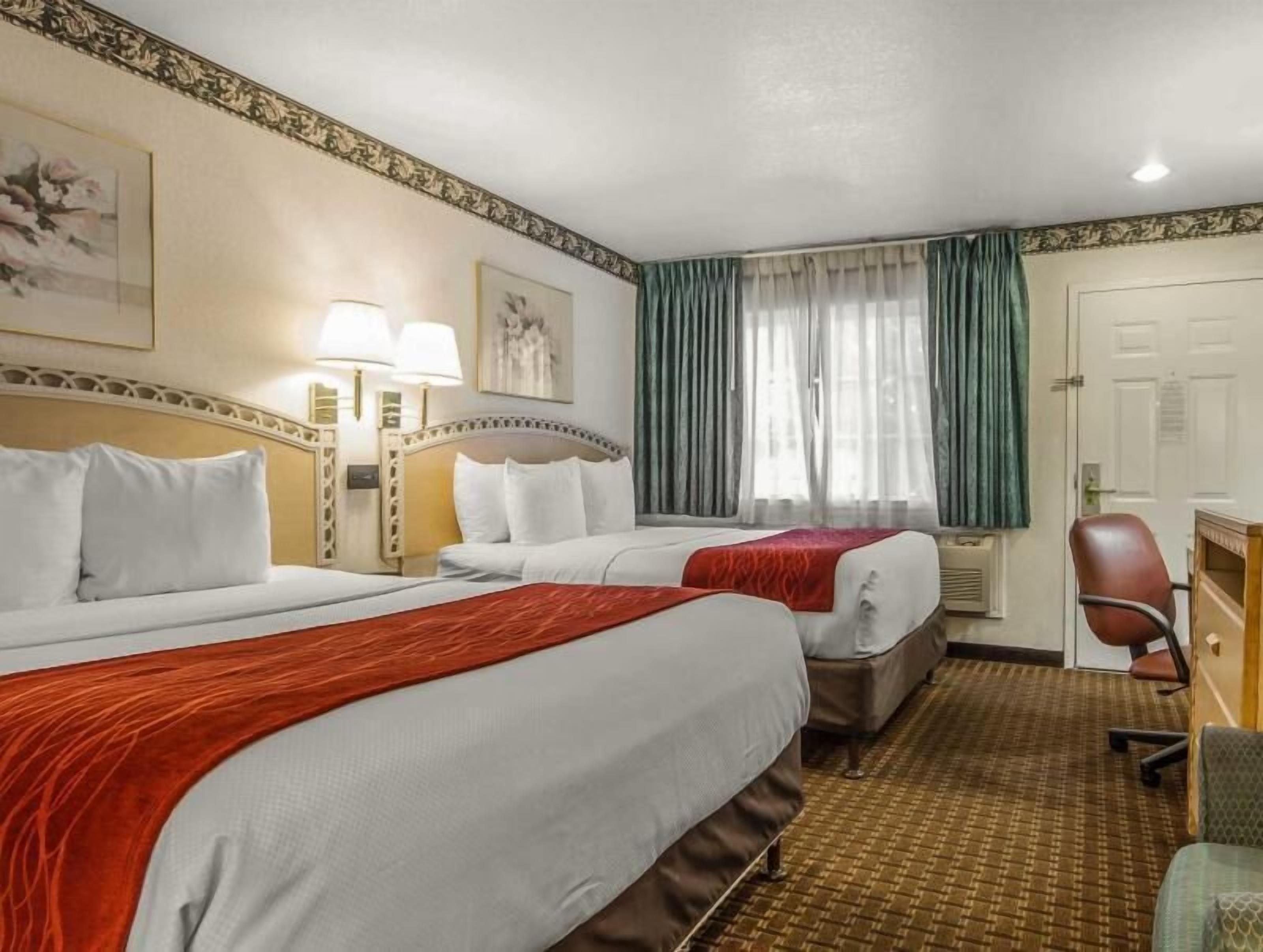 Premium bedding, pillowtop beds, desk, blackout drapes