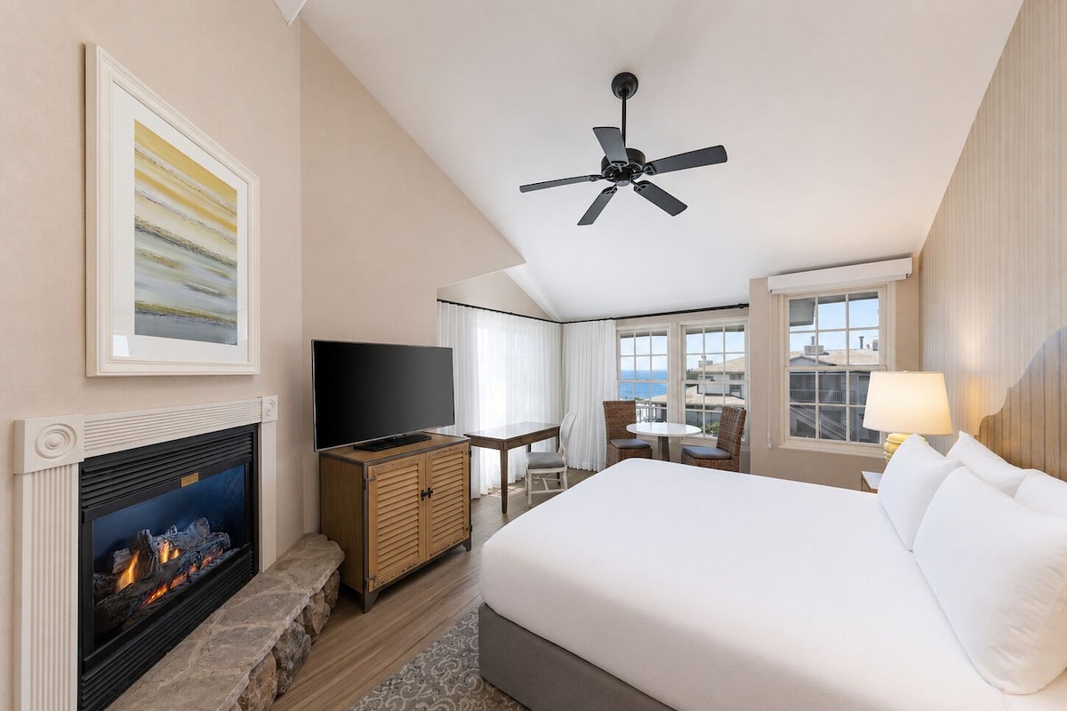 Room, 1 King Bed, Partial Ocean View | In-room safe, desk, laptop workspace, iron/ironing board