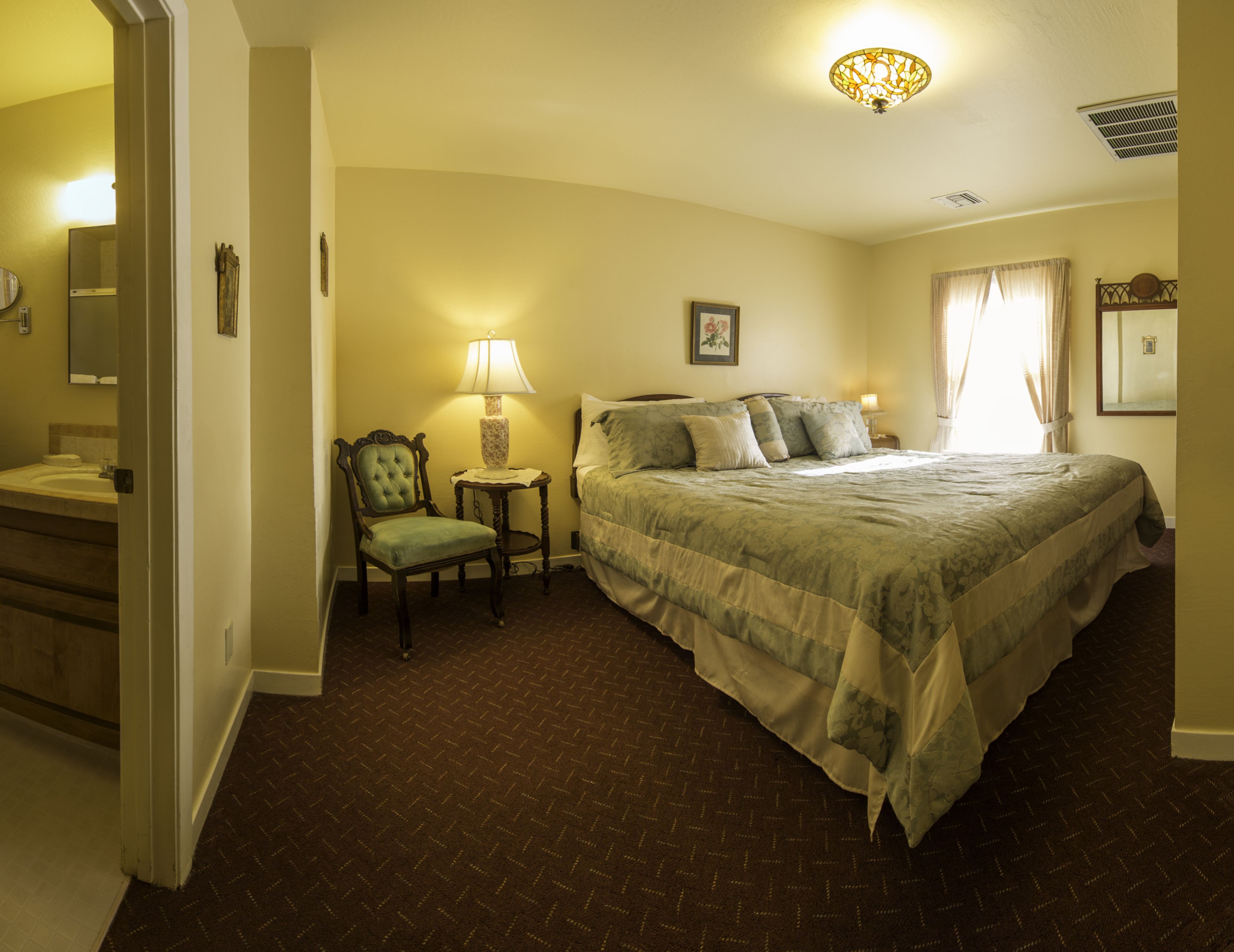 superior suite, 1 king bed, kitchenette | premium bedding, pillow-top beds, individually decorated