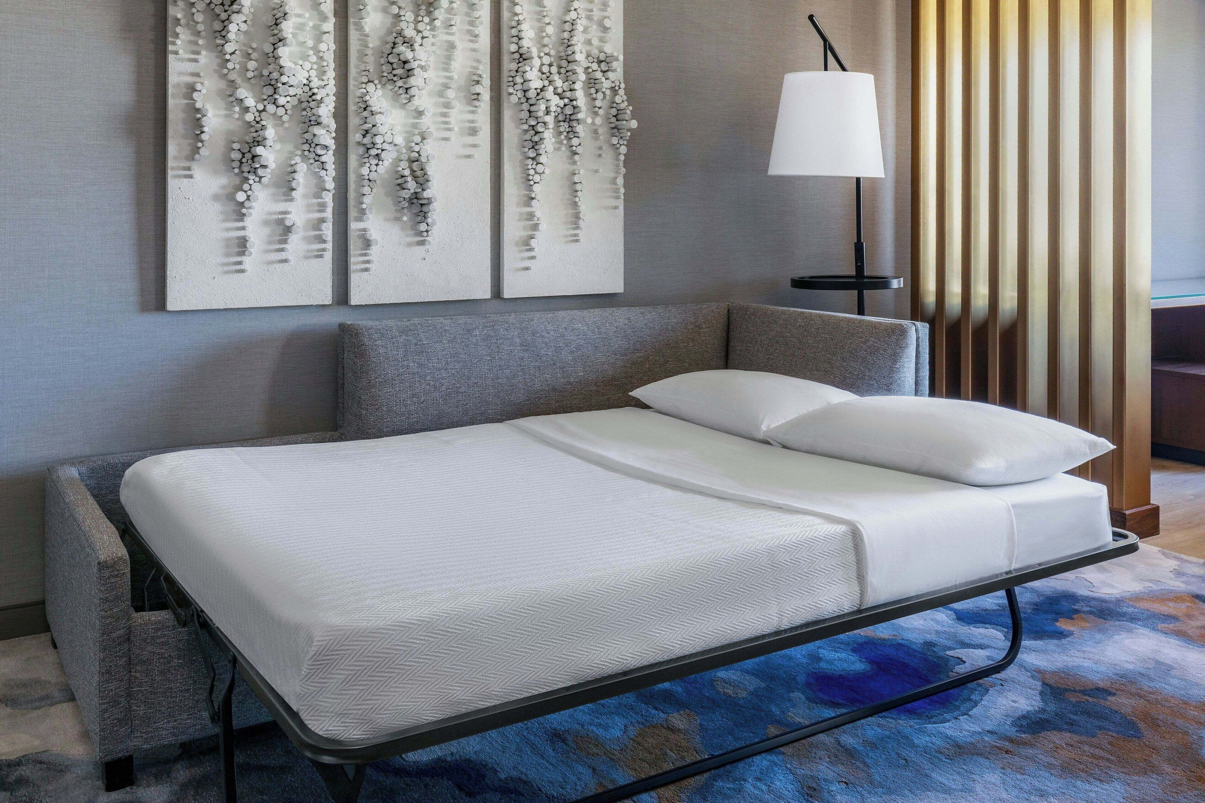 luxury suite, 1 bedroom | down duvets, desk, blackout curtains, iron/ironing board