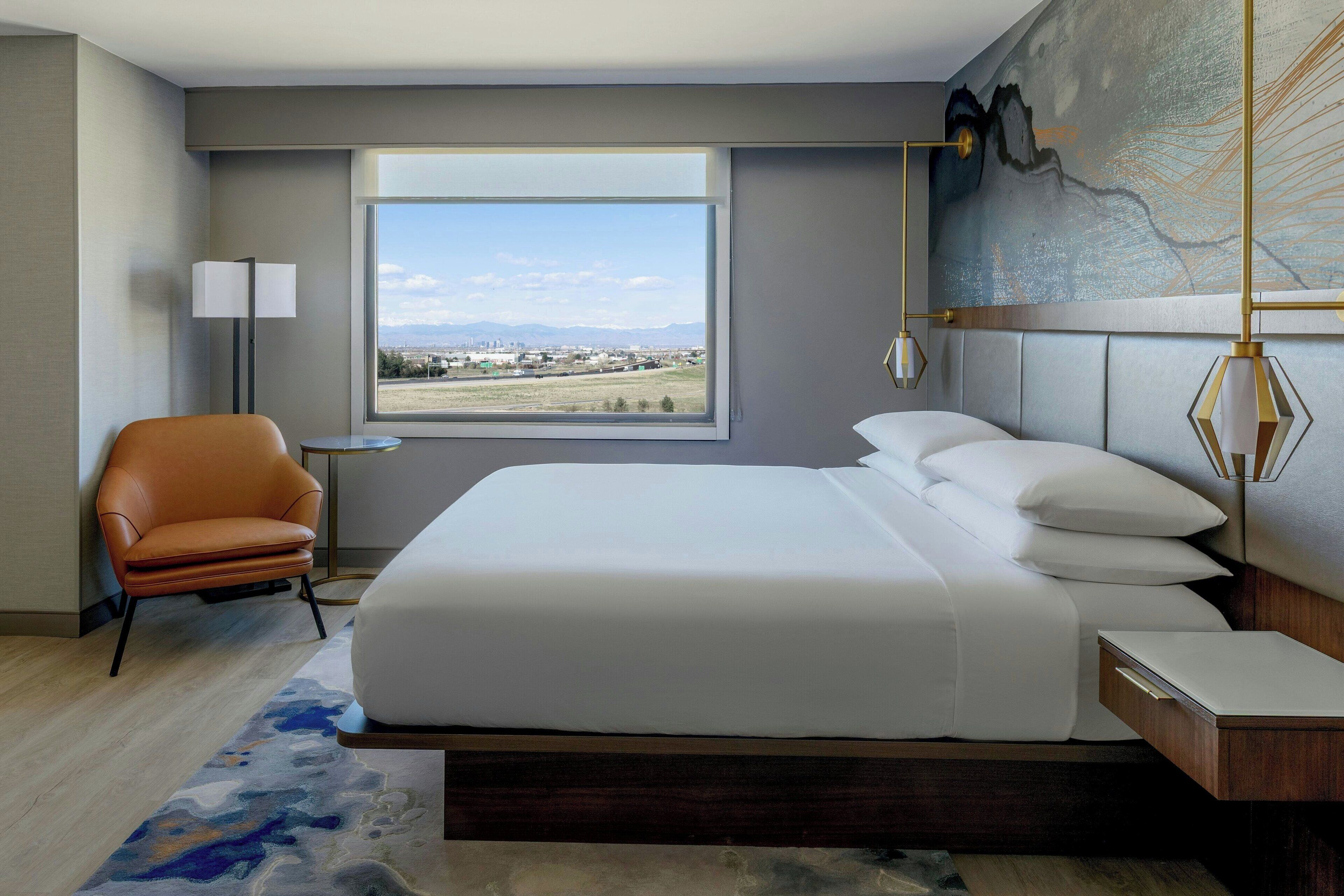 luxury suite, 1 bedroom | down duvets, desk, blackout curtains, iron/ironing board