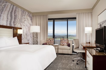 Down comforters, desk, blackout drapes, iron/ironing board at Marriott Denver Airport at Gateway Park