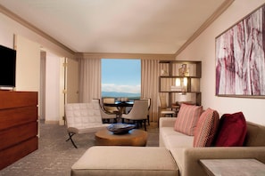 Luxury Suite, 1 Bedroom | Living area | 49-inch LCD TV with premium channels, TV, iPod dock