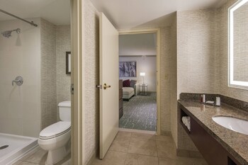 Combined shower/tub, designer toiletries, hair dryer, towels at Marriott Denver Airport at Gateway Park