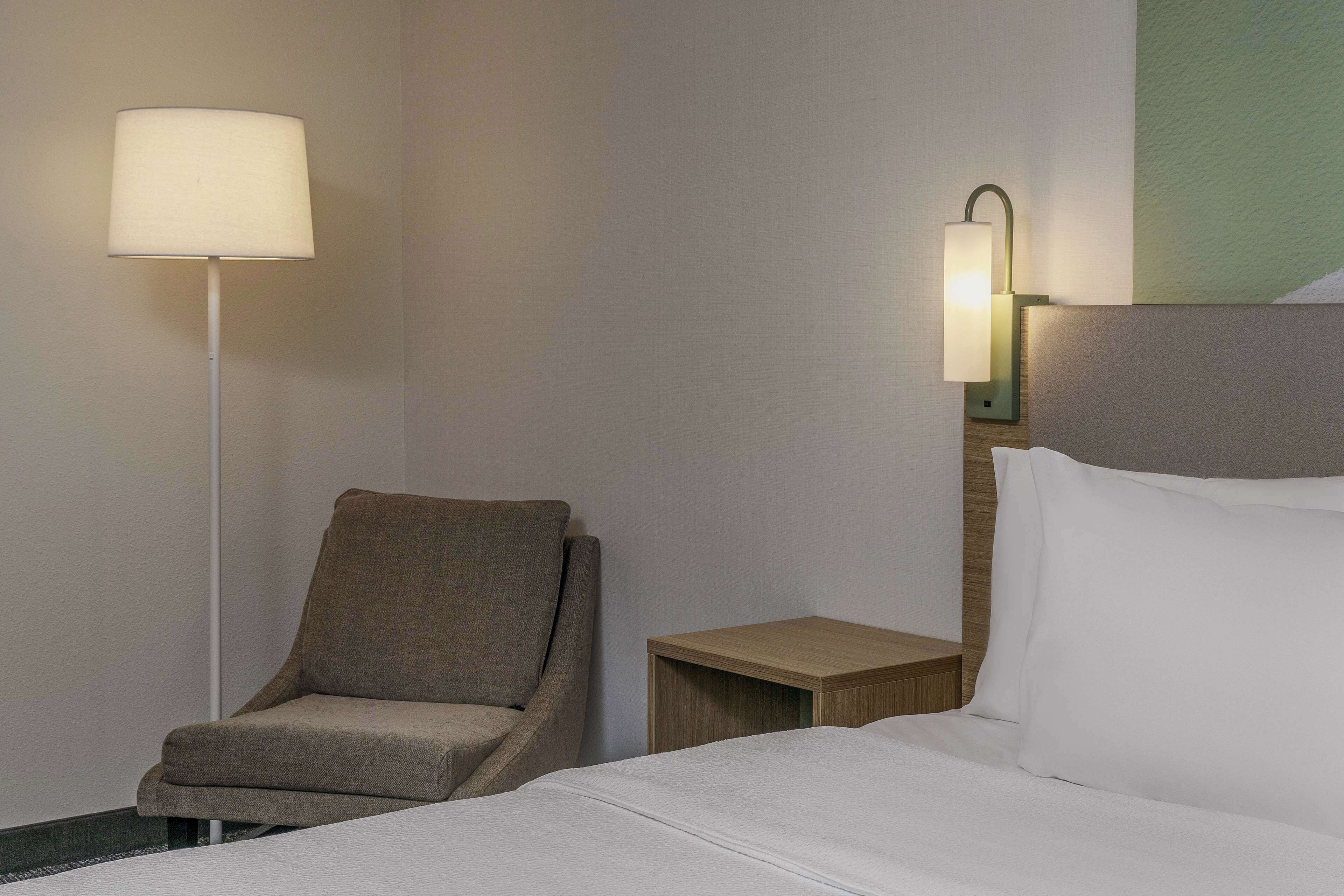 premium bedding, desk, blackout curtains, iron/ironing board