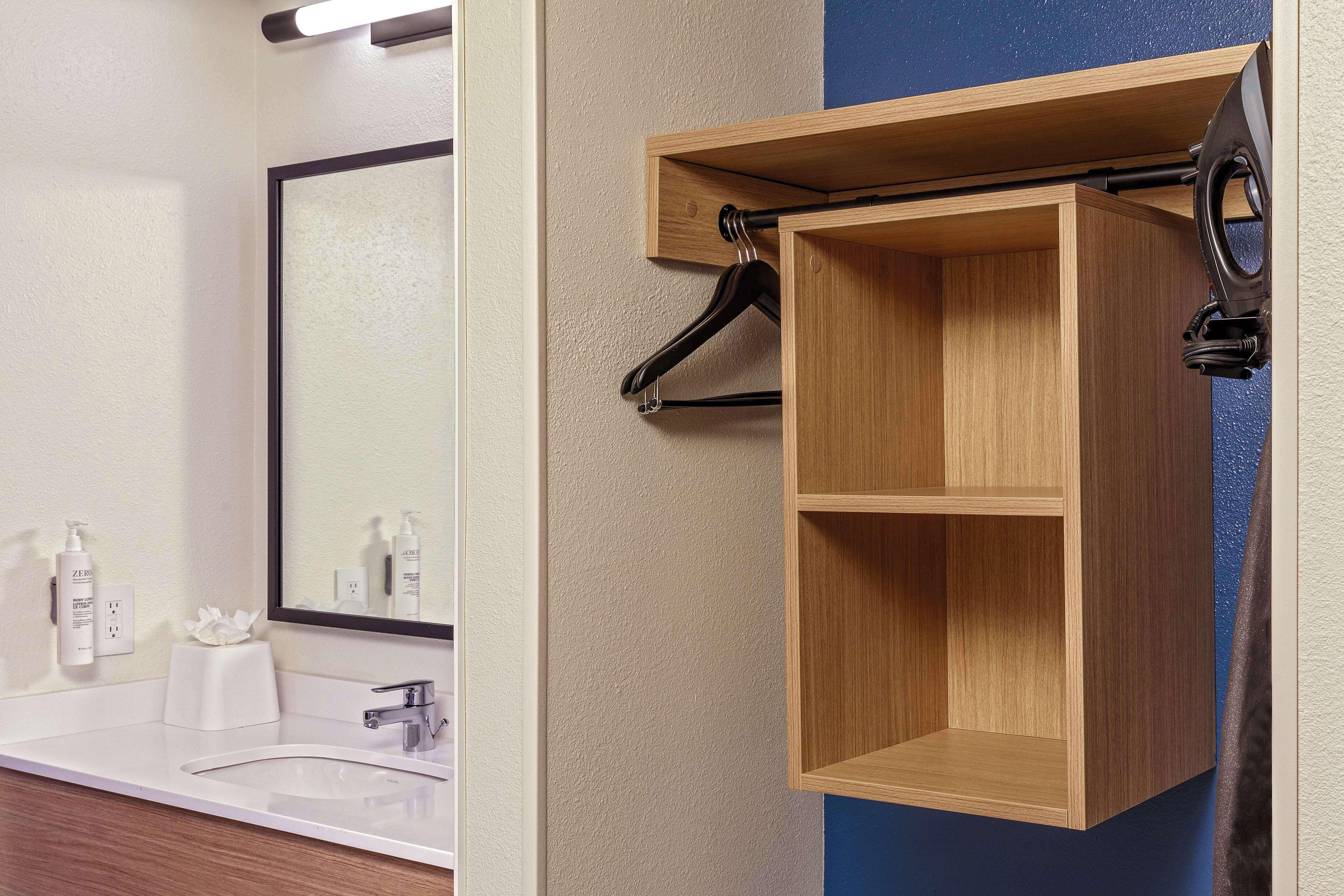 premium bedding, desk, blackout curtains, iron/ironing board