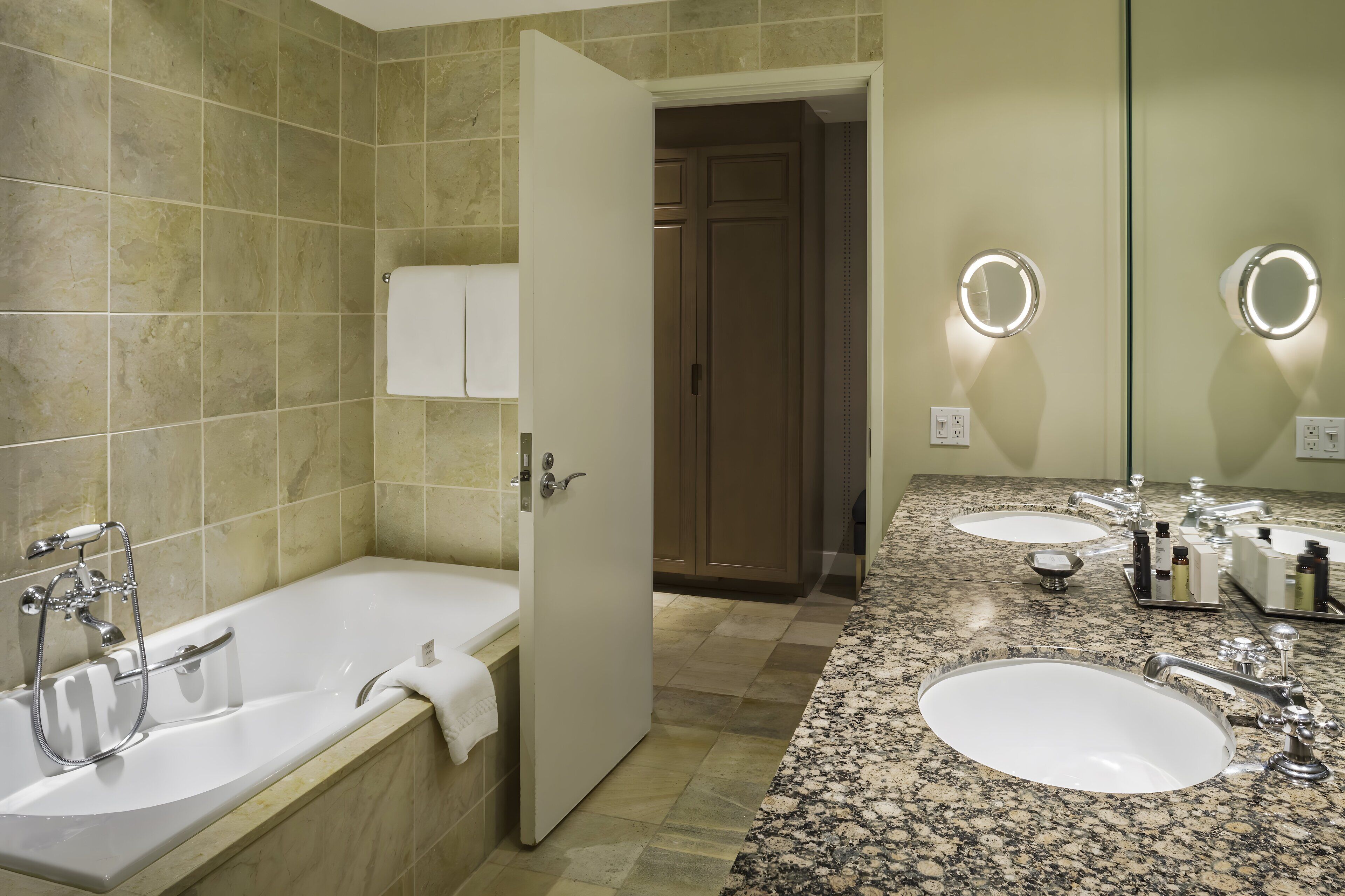 designer toiletries, hair dryer, bathrobes, towels