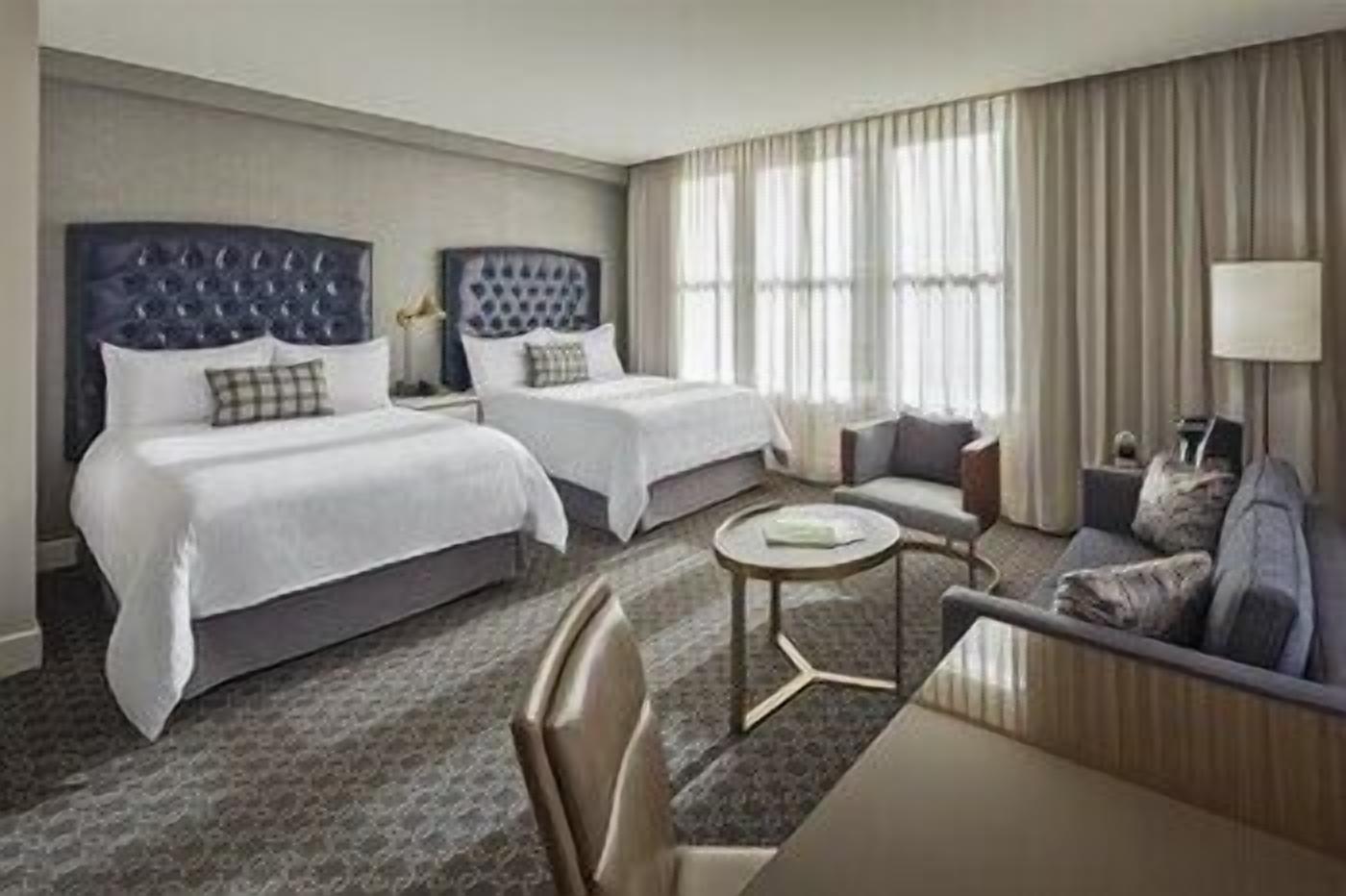 Premium bedding, pillow-top beds, minibar, in-room safe