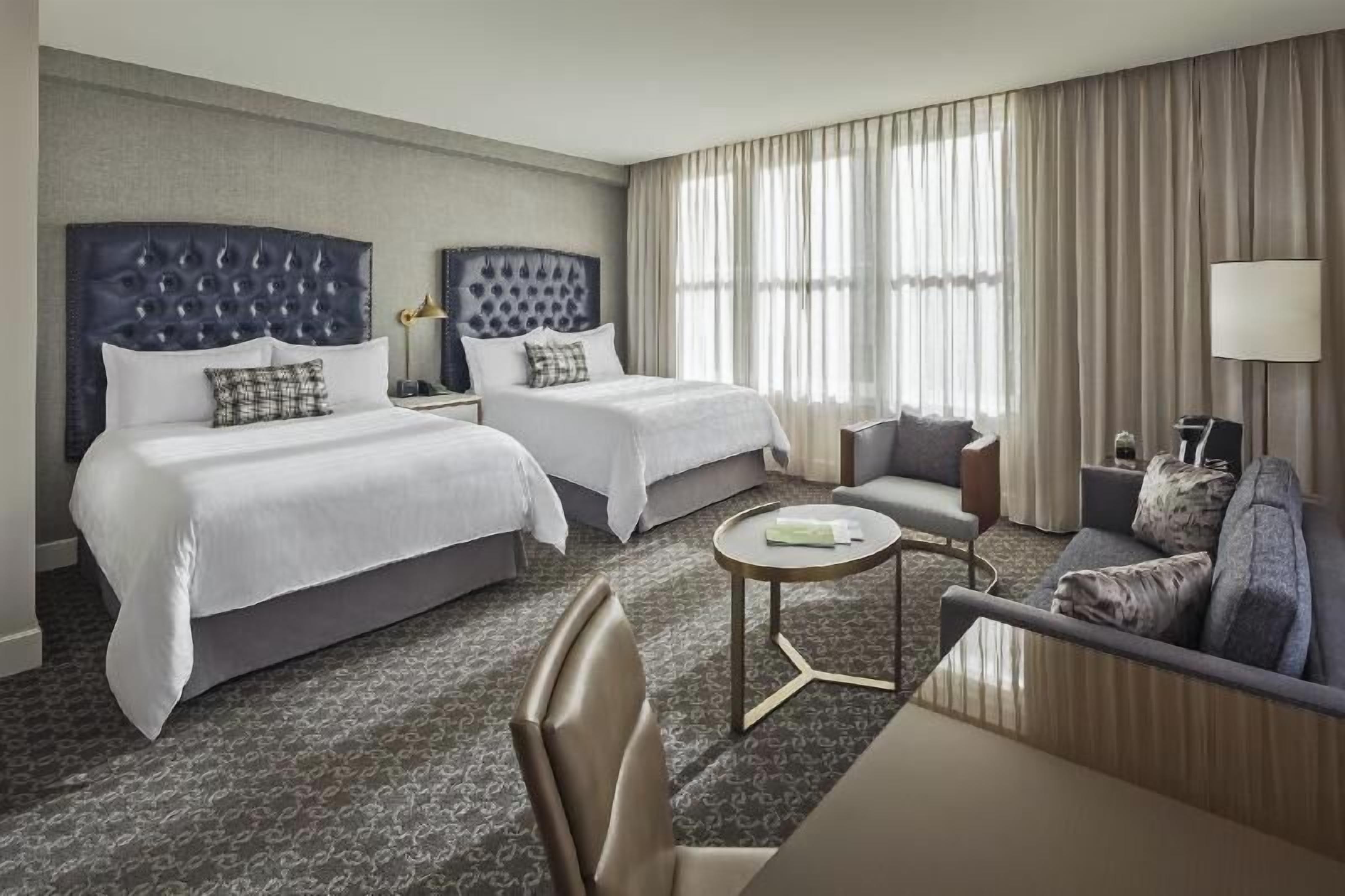 Premium bedding, pillow-top beds, minibar, in-room safe
