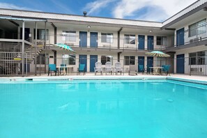 Seasonal outdoor pool, open 10:00 AM to 10:00 PM, pool umbrellas - Studio 6 Grand Junction, CO (Grand Junction)
