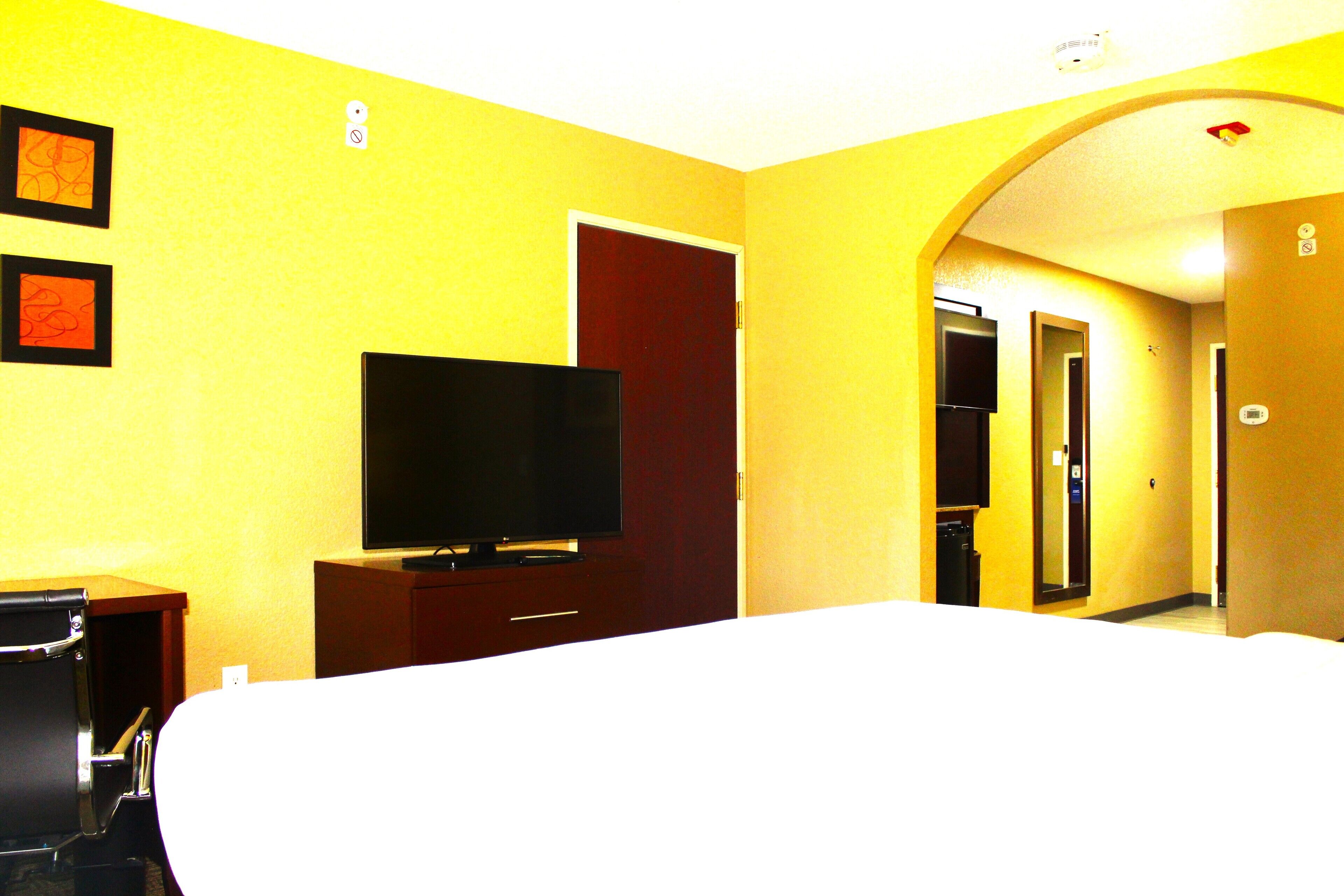 suite, 1 king bed with sofa bed, non smoking | desk, laptop workspace, blackout curtains, iron/ironing board