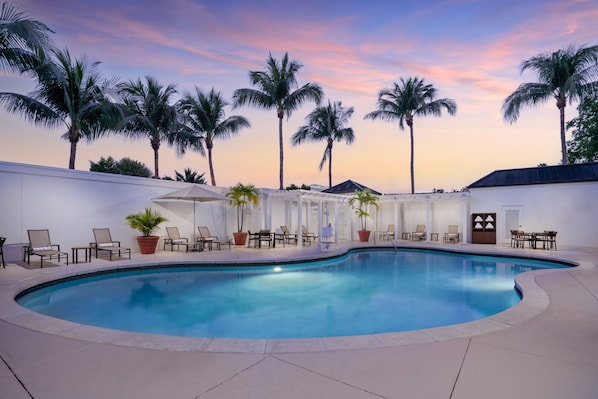 Outdoor pool, open 6:00 AM to 11:00 PM, pool umbrellas, sun loungers