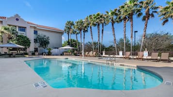 Outdoor pool, open 8:00 AM to 10:00 PM, free cabanas, pool umbrellas