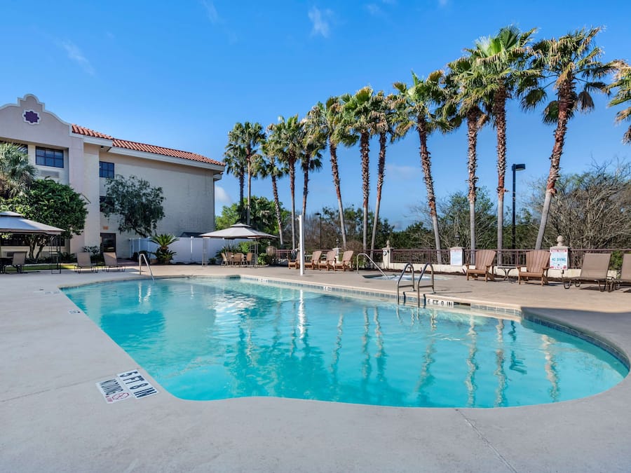 Outdoor pool, open 8:00 AM to 10:00 PM, free pool cabanas