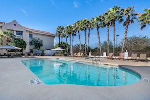 Outdoor pool, open 8:00 AM to 10:00 PM, free pool cabanas