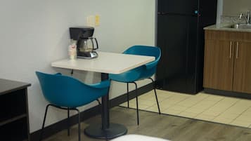 Full-size fridge, microwave, stovetop, coffee/tea maker