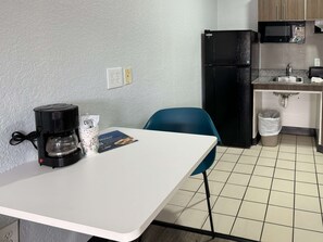 Full-size fridge, microwave, stovetop, coffee/tea maker
